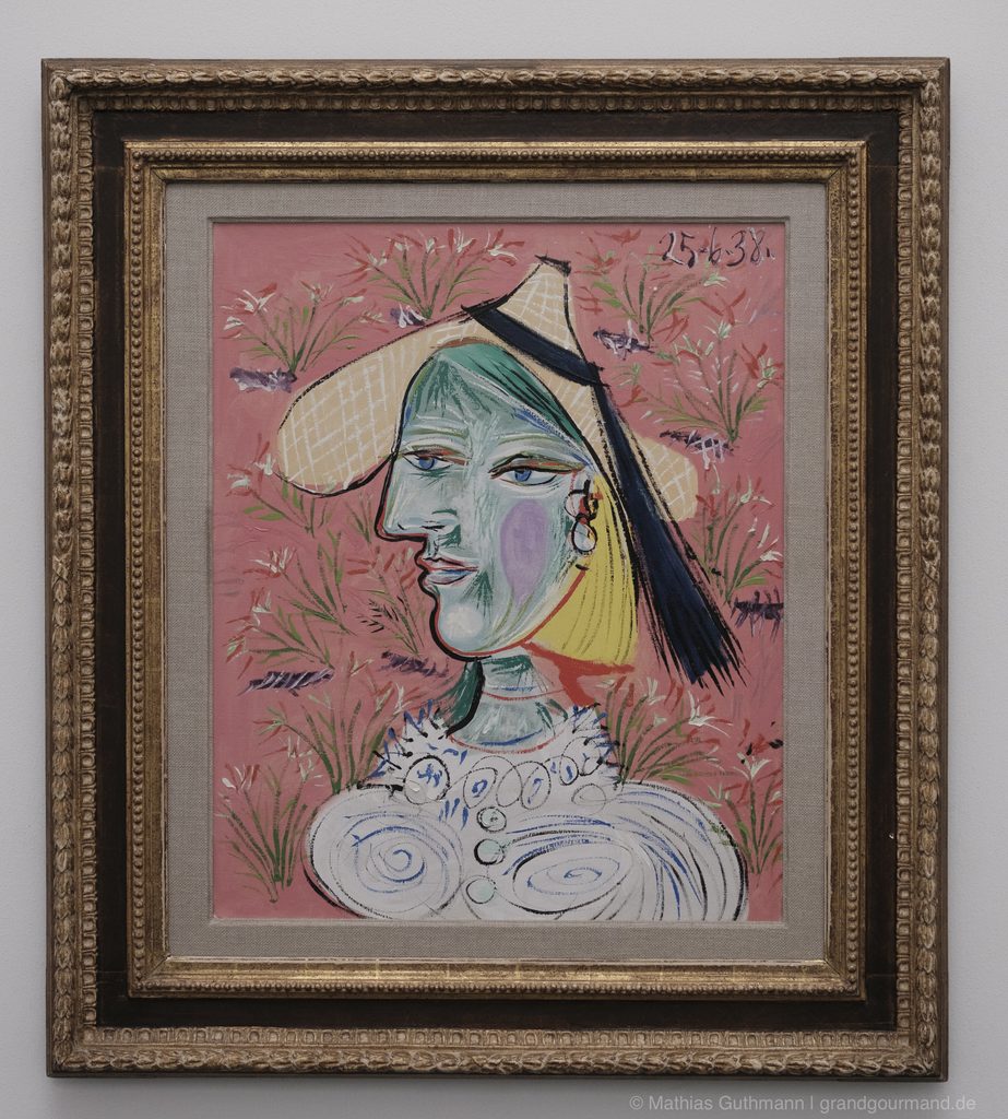 Pablo Picasso: Femme au chapeau de paille sur fond fleuri (Marie-Thérèse), 1938